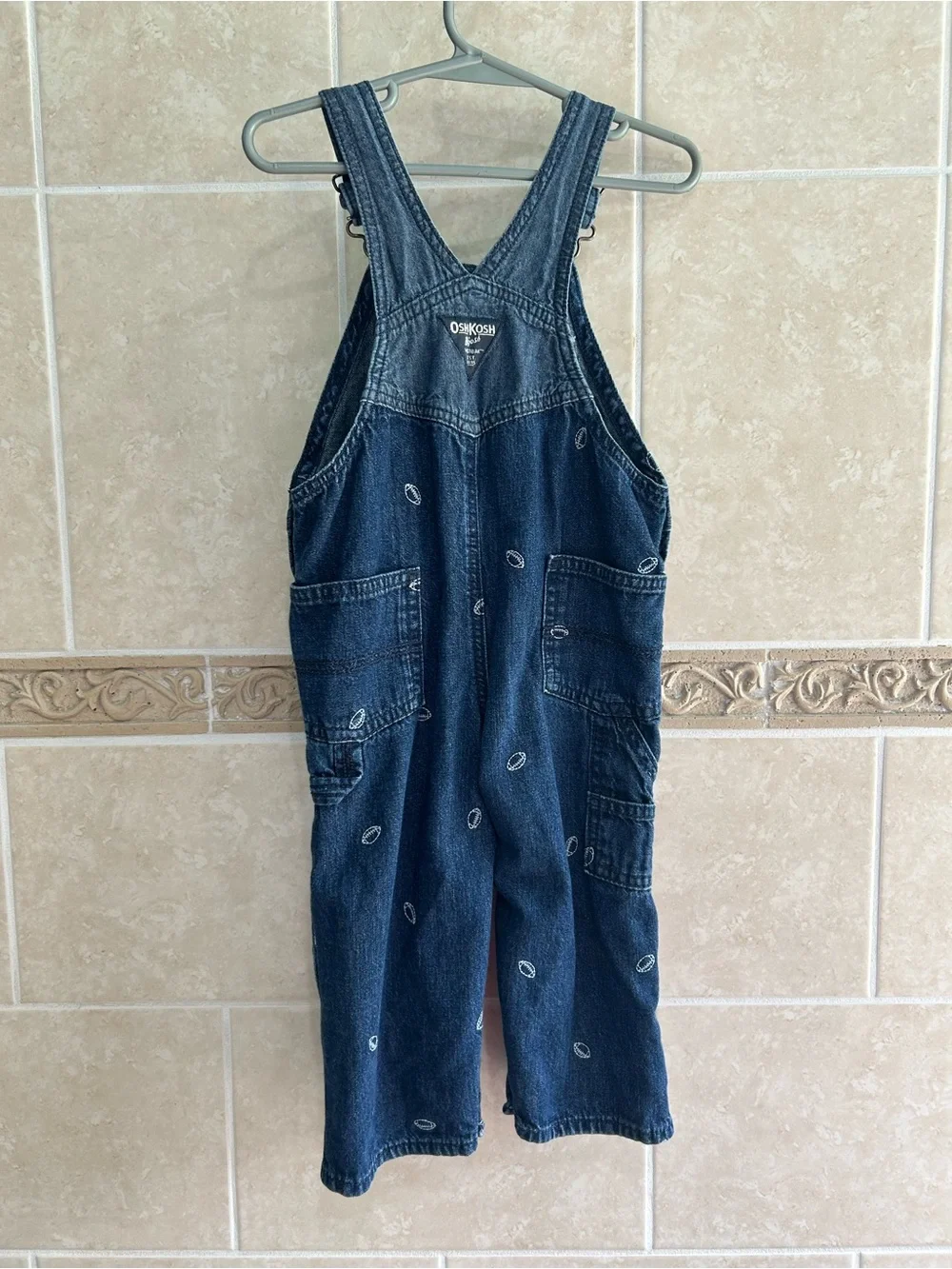 OshKosh Denim overalls with footballs